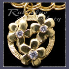 Gold 'Circle of Flowers' Charm with Gemstones Image