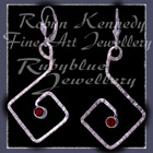 Sterling Silver and Mozambique Garnet 'Coronet' Earrings Image